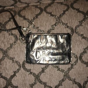Silver Michael Kors wristlet . Authentic